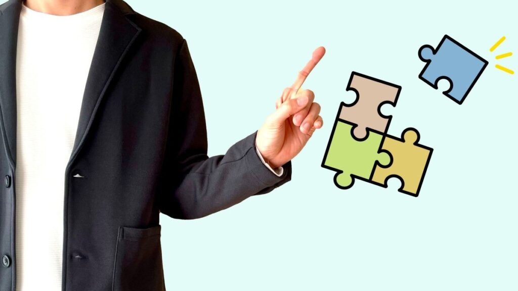 パズルのピースと問題解決するビジネスマン