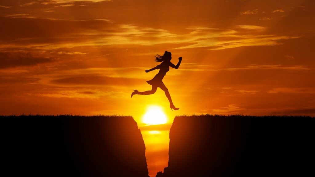 困難を飛び越える女性